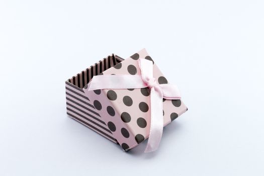 Pink gift box is opened isolated on white background., christmas gifts