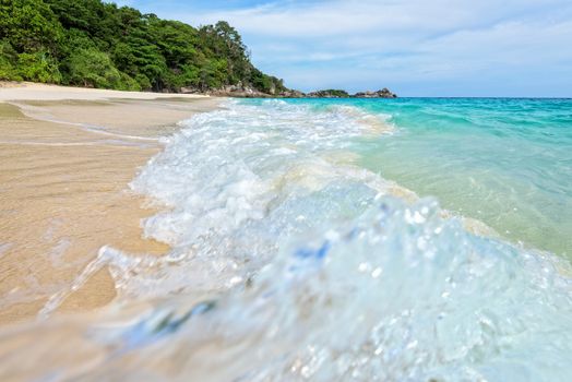 Beautiful landscape blue sea white sand and waves on the beach during summer at Koh Miang island in Mu Ko Similan National Park, Phang Nga province, Thailand