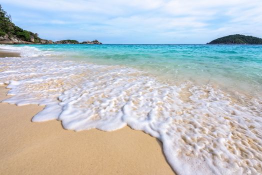 Beautiful landscape blue sea white sand and waves on the beach during summer at Koh Miang island in Mu Ko Similan National Park, Phang Nga province, Thailand