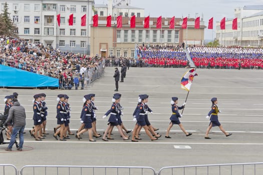 Samara, Russia - May 9: Russian woman midshipmans march at the parade on annual Victory Day, May, 9, 2015 in Samara, Russia.