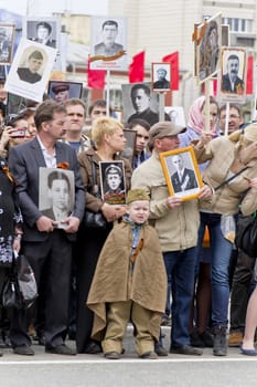 Samara, Russia - May 9, 2015: Procession of the people in Immortal Regiment on annual Victory Day