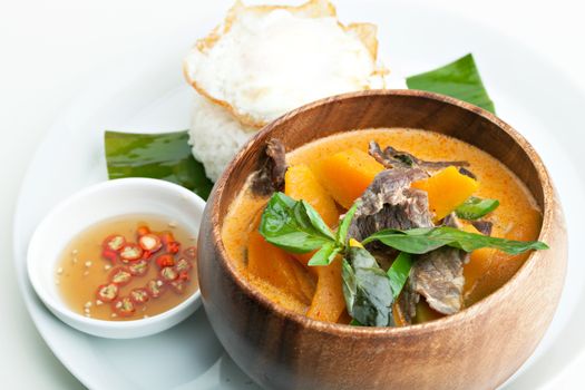 Pumpkin red curry with beef and basil.