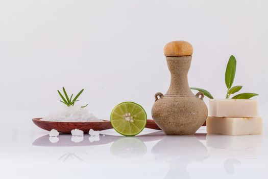 Spa treatment  sea salt and herbs natural spa Ingredients for scrub and skin care isolate on white background.