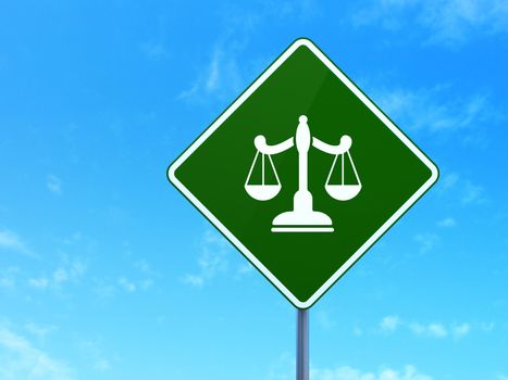 Law concept: Scales on green road (highway) sign, clear blue sky background, 3d render