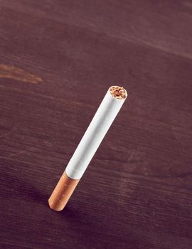 cigarette isolated on old wood background