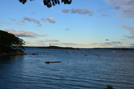 View of Falmouth Maine coastal area with boats moored.