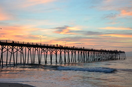 Sunrise at Kure Beach North Carolina on a warm summer morning.