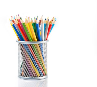 colorful pencils in container isolated on white background with space for text