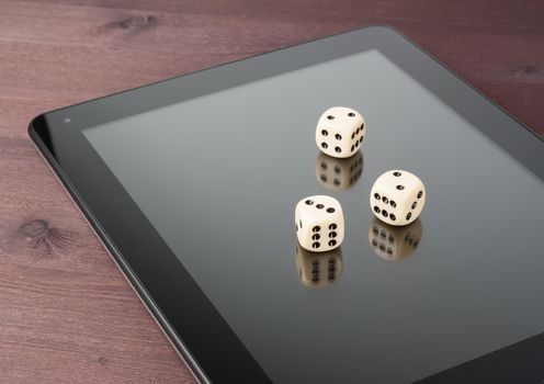 dice on digital tablet pc on old wood table, concept of texas game online