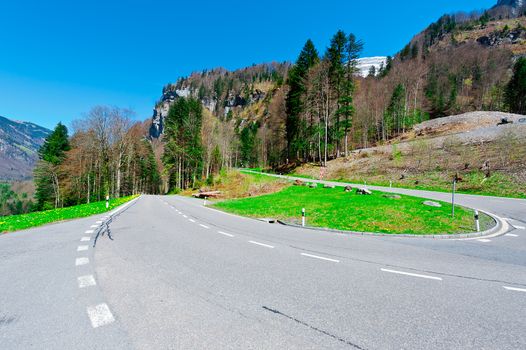 Winding Paved Road in the Swiss Alps