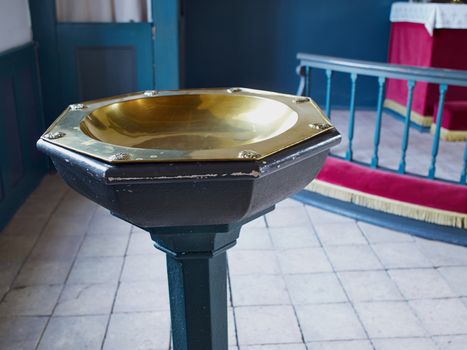 Full view of a Baptismal font in a Lutheran church