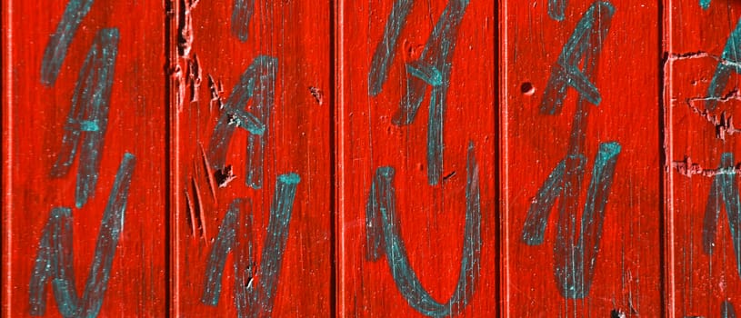 Graffitis on a red background in denmark