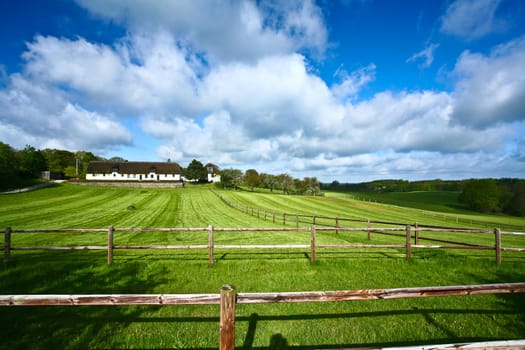 Landscape with old farm in spring in Denmark