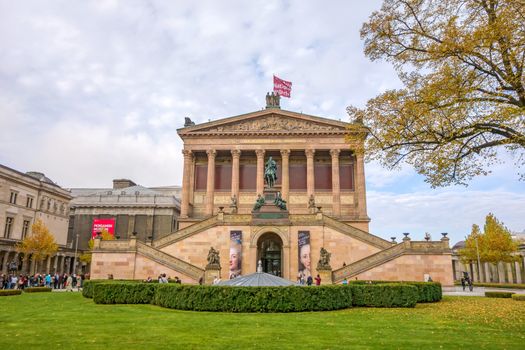 Berlin, Germany - October 26, 2013: Exterior view of Alte Nationalgalerie (Old National Gallery) on the Museumsinsel in Berlin-Mitte. The Pergamon museum on the left in the background.