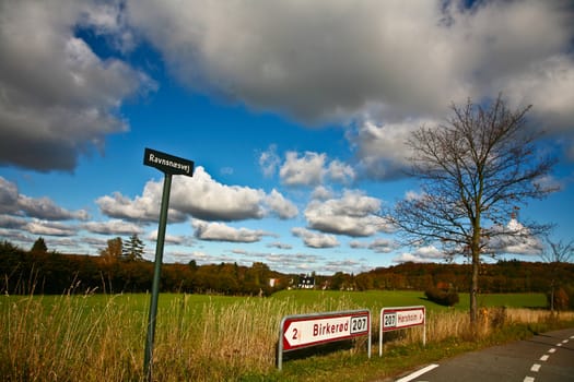 Ravnnaesvej sign and blue sky in denmark