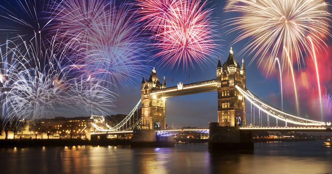 Tower bridge with firework, celebration of the New Year in London, UK