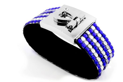 Modern bracelet with crystals on a white background