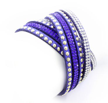 Modern bracelet with crystals on a white background