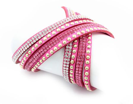 Modern bracelet with crystals on a white background