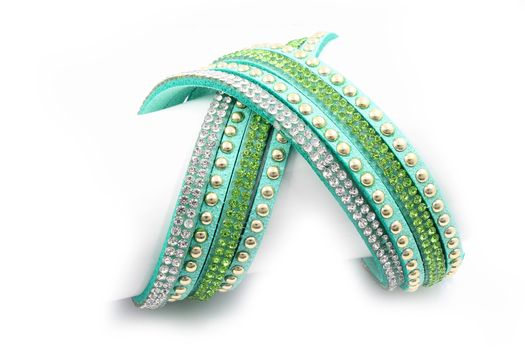 Modern bracelet with crystals on a white background