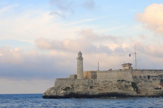 View of el morro fortress in havana bay at sunset, cuba