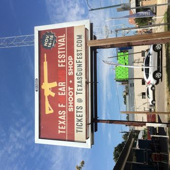 USA, Austin: As mass shootings spur discussions on gun control in the United States, a billboard advertisement for an upcoming gun show in Austin, Texas appears vandalized on October 7, 2015, now reading Texas Fear Festival. This is an example of culture jamming, as Austin is a liberal city in a predominantly conservative, pro-gun state; and this political divide has earned the city a reputation for being a blue dot in a sea of red.