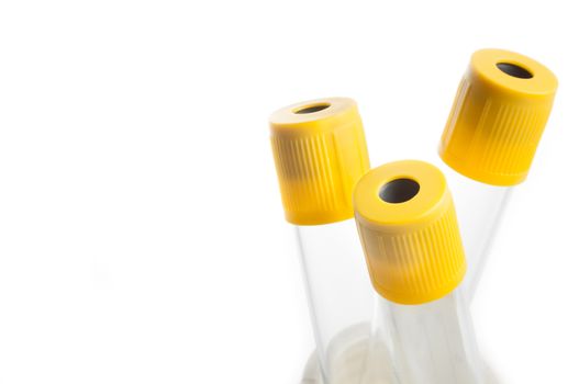 detail of test tubes in laboratory on white background with space for text