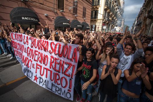 ITALY, Palermo: Thousands of students marched and held banners against Renzi's school reform in Palermo, Italy on October 9, 2015.A theme of the protests is the revisions to the calculation of family income, which some say will reduce scholarships and housing for students. Students throughout the country protested what's know as La Buona Scuola.  A spokesman for the protesters said they were going to announce a week of mobilization lasting until October 17. They plan to launch an attack for free education and reversal of policies. 