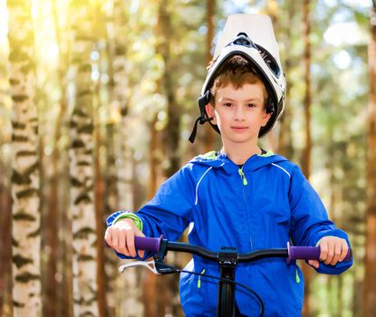 Portrait of boy on a bike
