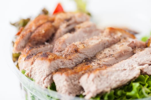 Grilled pork and teriyaki sauce (Japanese sweet sauce) cooked by clean food concept with salad in lunch box