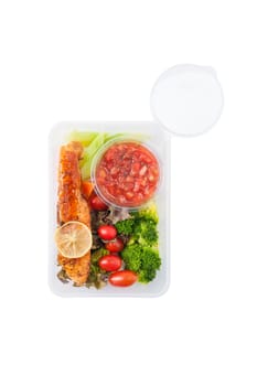 Grilled salmon with tomato salsa and salad cooked by clean food concept in lunch box isolated on white background