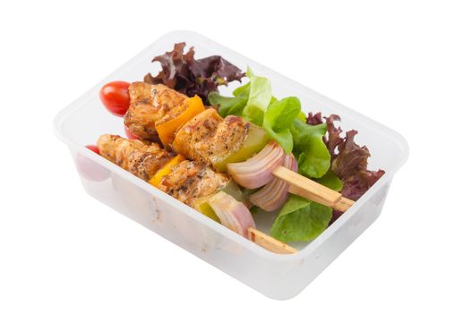 Chicken breast barbecue cooked by clean food concept and vegetables in lunch box isolated on white background