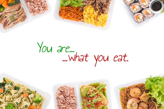 "You are what you eat" is written on white background with lunch box cooked by clean food concept (easy removable text)