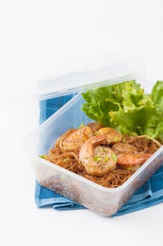 Shrimp and vermicelli baked with herbs (Goong Ob Woonsen) and cooked by clean food concept in lunch box set on white table