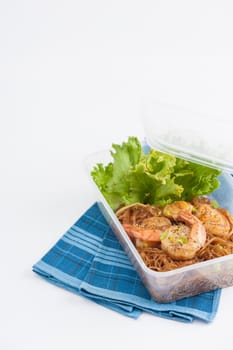 Shrimp and vermicelli baked with herbs (Goong Ob Woonsen) and cooked by clean food concept in lunch box set on white table
