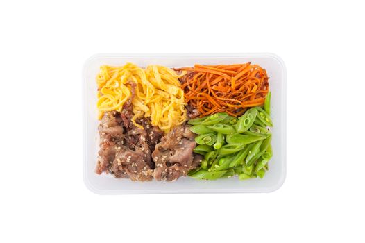 Bibimbub in clean food style. Brown rice with roasted pork, egg, and vegetables isolated on white background with clipping path