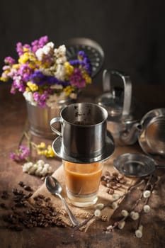 Vietnamese style drip coffee with condense milk, with low key scene