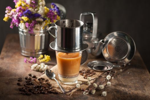 Vietnamese style drip coffee with condense milk, with low key scene