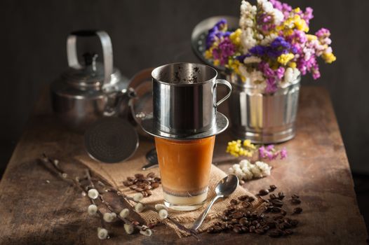 Vietnamese style drip coffee with condense milk, with low key scene