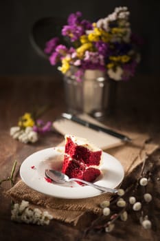 Bits of Red velvet cake in cafe with low key scene