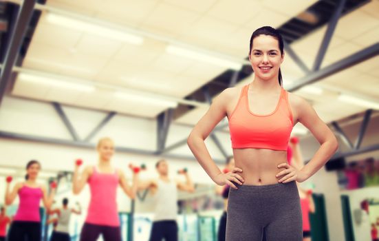 fitness and diet concept - smiling teenage girl in sportswear