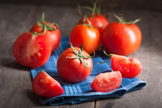 Vegetables on wood table with low key scene