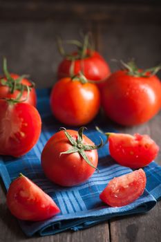 Vegetables on wood table with low key scene