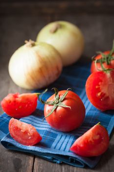 Vegetables on wood table with low key scene