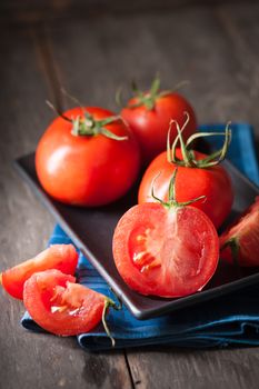 Vegetables on wood table with low key scene