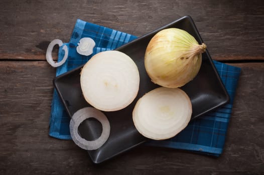 Vegetables on wood table with low key scene