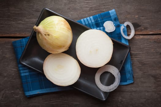 Vegetables on wood table with low key scene