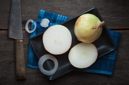 Vegetables on wood table with low key scene