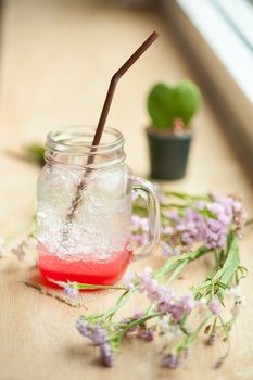 Italian soda on wood bar in cafe