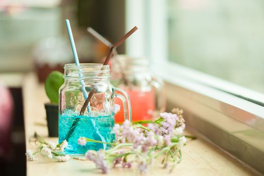 Italian soda on wood bar in cafe